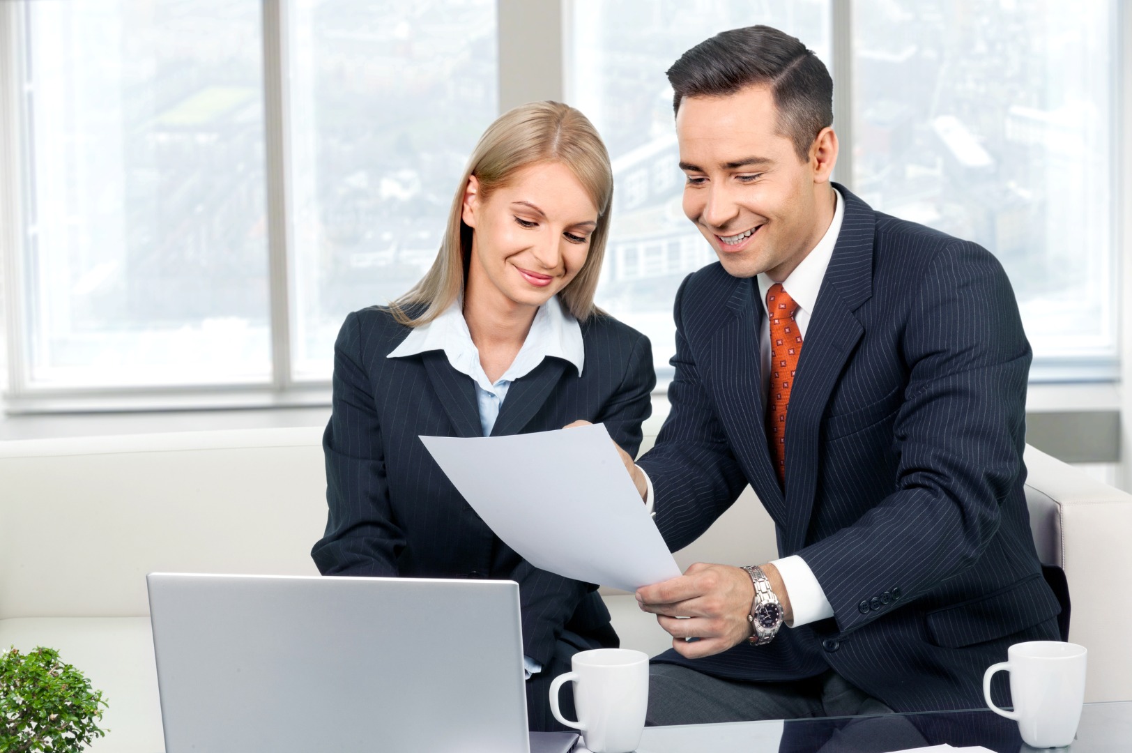 CorePoint consultants reviewing a client report